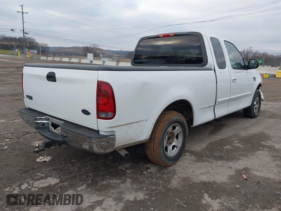 2003 Ford F-150 XL with VIN 1FTRX17W43NA31343, listed as a IAAI auction lot 41576625 with 1 mi miles. Bid and sale history available at carsss.com. Image 4.