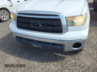 2011 Toyota Tundra with VIN 5TFUY5F1XBX198815, listed as a IAAI auction lot 42571444 with 281,114 mi miles and . Bid and sale history available at DreamBid. Image 13.