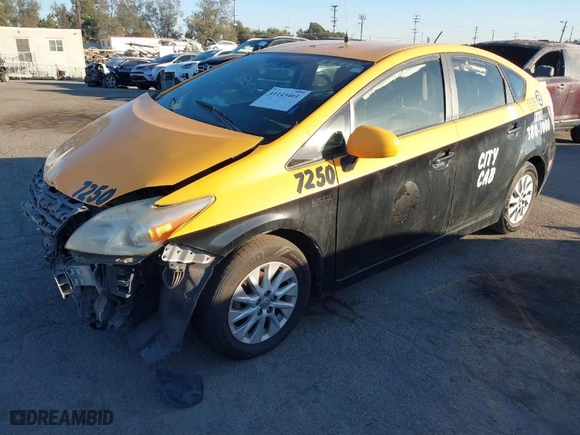 2014 Toyota Prius Plug-In with VIN JTDKN3DP6E3054041, listed as a IAAI auction lot 41143461 with 348,162 mi miles. Bid and sale history available at carsss.com. Image 2.