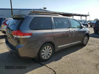 2014 Toyota Sienna Limited with VIN 5TDDK3DC8ES078175, listed as a Copart auction lot 61138585 with 98,527 mi miles and Salvage title. Bid and sale history available at DreamBid. Image 3.