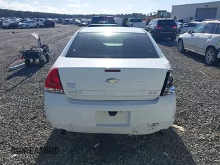 2013 Chevrolet Impala Police with VIN 2G1WD5E34D1265263, listed as a IAAI auction lot 41115415 with 191,679 mi miles. Bid and sale history available at carsss.com. Image 16.