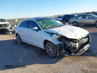 2016 Audi A3 2.0T Premium Plus with VIN WAUE8GFF0G1010838, listed as a IAAI auction lot 41210115 with 126,667 mi miles. Bid and sale history available at carsss.com. Image 1.