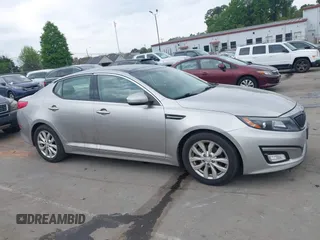2015 Kia Optima EX with VIN 5XXGN4A70FG422277, listed as a IAAI auction lot 41932887 with 150,386 mi miles. Bid and sale history available at carsss.com. Image 13.