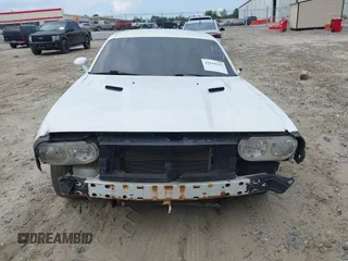 2013 Dodge Challenger SXT с VIN 2C3CDYAG0DH607372, выставлен на аукционе IAAI как лот 42819112 с пробегом 223 376 миль миль и . История ставок и продаж доступна на DreamBid. Изображение 12.