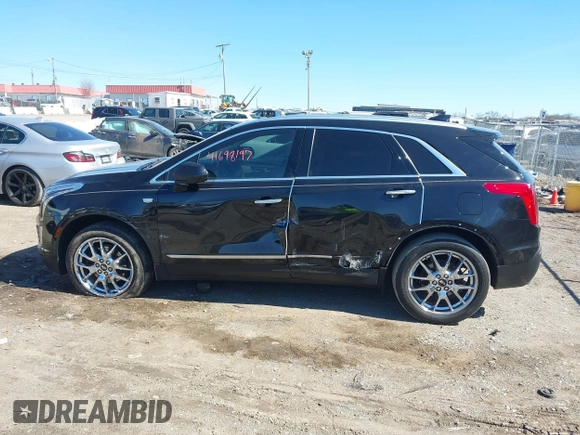 2017 Cadillac XT5 Premium Luxury FWD z VIN 1GYKNCRS8HZ127001, wystawiony jako IAAI lot #41698197 z przebiegiem 120 978 mil mil oraz . Historia ofert i sprzedaży dostępna na DreamBid. Obrazek 14.