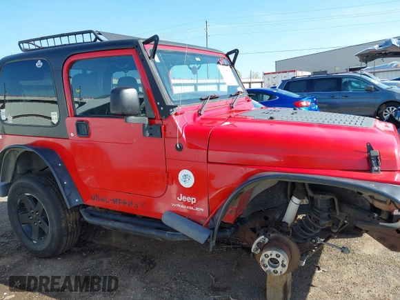 2004 Jeep Wrangler Sport Right Hand Drive with VIN 1J4F449S74P796957, listed as a IAAI auction lot 41987562 with 106,730 mi miles and . Bid and sale history available at carsss.com. Image 13.
