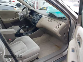 1999 Honda Accord LX z VIN 1HGCG5646XA147476, wystawiony jako IAAI lot #41752857 z przebiegiem 86 339 mil mil oraz . Historia ofert i sprzedaży dostępna na DreamBid. Obrazek 5.