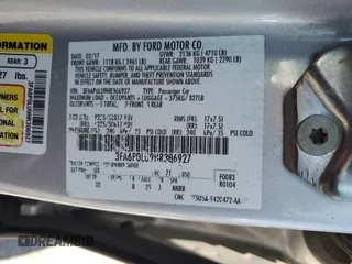 2017 Ford Fusion Hybrid SE z VIN 3FA6P0LU9HR306927, wystawiony jako Copart lot #63943395 z przebiegiem 157 851 mil mil oraz Czysty tytuł • Clean title. Historia ofert i sprzedaży dostępna na DreamBid. Obrazek 12.