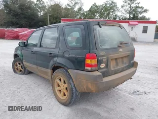 2002 Ford Escape with VIN 1FMCU02132KD51298, listed as a IAAI auction lot 41550132 with 218,830 mi miles and . Bid and sale history available at DreamBid. Image 3.