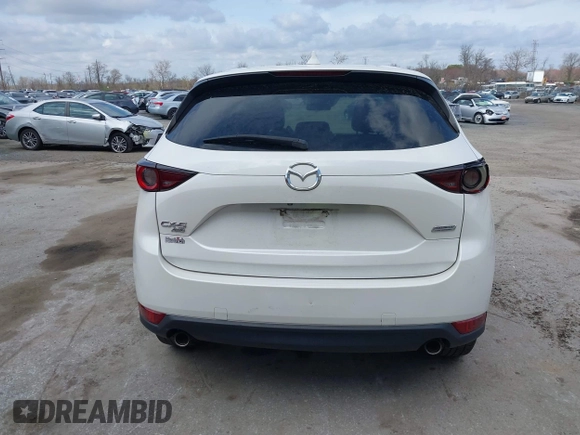 2018 Mazda CX-5 Touring with VIN JM3KFBCMXJ0353369, listed as a IAAI auction lot 41902554 with 154,104 mi miles and . Bid and sale history available at DreamBid. Image 17.