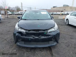 2022 Toyota Prius L Eco with VIN JTDKAMFUXN3174204, listed as a IAAI auction lot 41747089 with 79,531 mi miles. Bid and sale history available at carsss.com. Image 12.