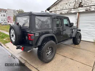 2018 Jeep Wrangler Unlimited Sport with VIN 1C4HJXDG8JW166409, listed as a Copart auction lot 71764992 with 33,521 mi miles and . Bid and sale history available at DreamBid. Image 4.