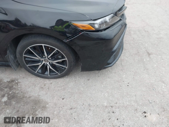 2023 Toyota Camry SE with VIN 4T1G11AK7PU123665, listed as a IAAI auction lot 41142628 with 67,294 mi miles and . Bid and sale history available at DreamBid. Image 17.
