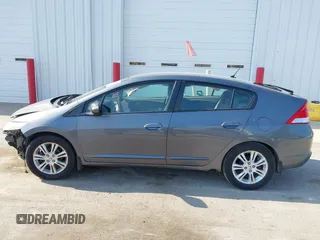 2011 Honda Insight EX z VIN JHMZE2H7XBS006254, wystawiony jako IAAI lot #42222213 z przebiegiem 244 078 mil mil oraz . Historia ofert i sprzedaży dostępna na DreamBid. Obrazek 14.