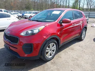 2018 Kia Sportage LX with VIN KNDPM3AC0J7445750, listed as a IAAI auction lot 41936557 with 122,268 mi miles and . Bid and sale history available at DreamBid. Image 2.
