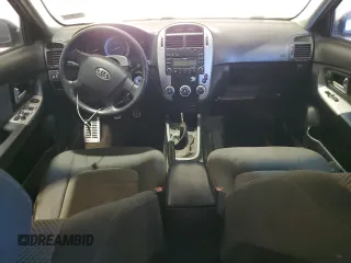 2009 Kia Spectra EX with VIN KNAFE221595027222, listed as a Copart auction lot 71863644 with Not Provided miles and Clean Title. Bid and sale history available at carsss.com. Image 8.