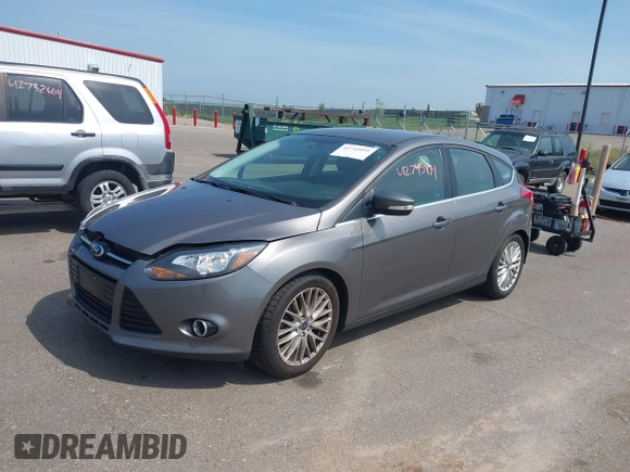 2014 Ford Focus Titanium with VIN 1FADP3N26EL453107, listed as a IAAI auction lot 42745891 with 148,743 mi miles and . Bid and sale history available at DreamBid. Image 2.
