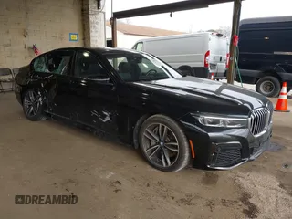 2020 BMW 7 Series 750i xDrive with VIN WBA7U2C02LGJ59475, listed as a IAAI auction lot 41975021 with 52,818 mi miles and . Bid and sale history available at carsss.com. Image 1.