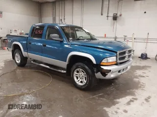 2003 Dodge Dakota SLT with VIN 1D7HG48N03S204480, listed as a IAAI auction lot 41619868 with 135,359 mi miles and . Bid and sale history available at carsss.com. Image 1.
