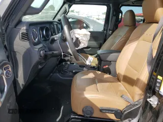 2022 Jeep Wrangler Unlimited Sahara Altitude with VIN 1C4HJXEG9NW191002, listed as a Copart auction lot 58635414 with 21,301 mi miles and Salvage title. Bid and sale history available at DreamBid. Image 7.
