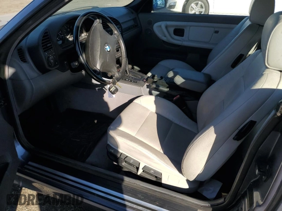 1999 BMW 3 Series 323icA with VIN WBABJ8332XEM24560, listed as a Copart auction lot 80756544 with 63,056 mi miles and Salvage Title. Bid and sale history available at carsss.com. Image 7.