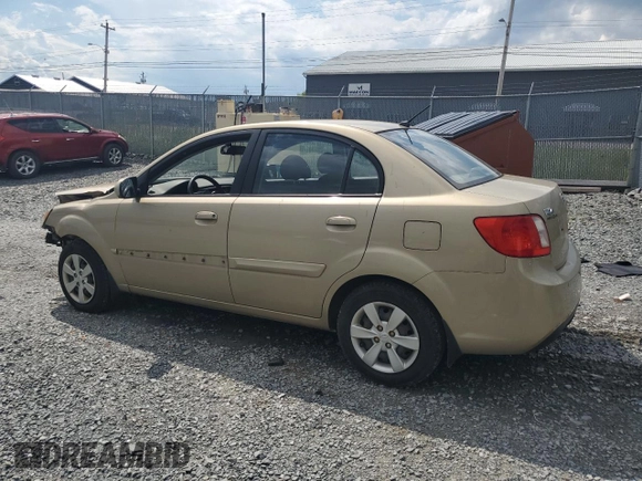 2011 Kia Rio with VIN KNADH4B30B6712241, listed as a Copart auction lot 61301184 with 159,902 mi miles and Salvage Title. Bid and sale history available at DreamBid. Image 2.