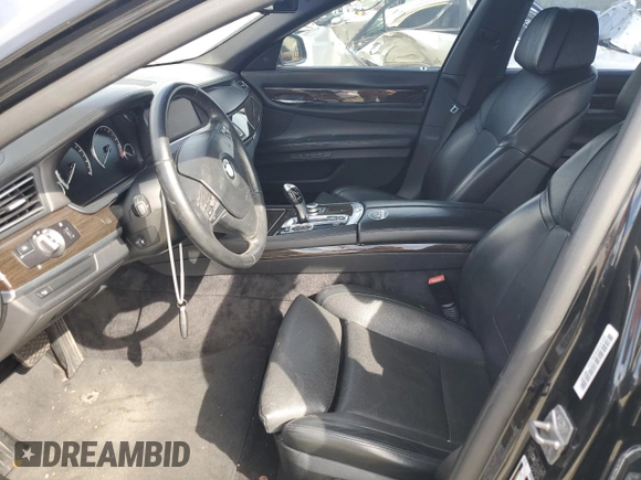 2011 BMW 7 Series with VIN WBAKX8C52BC198377, listed as a Copart auction lot 70003444 with 173,725 mi miles and Salvage title. Bid and sale history available at DreamBid. Image 7.
