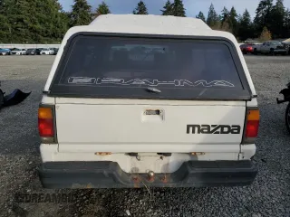 1989 Mazda B-Series Truck z VIN JM2UF3136K0755419, wystawiony jako Copart lot #81501824 z przebiegiem 113 124 mil mil oraz Szkoda całkowita • Salvage title. Historia ofert i sprzedaży dostępna na DreamBid. Obrazek 6.
