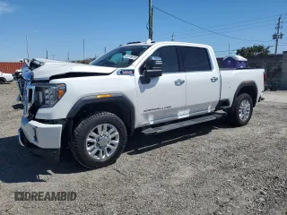 2022 GMC Sierra 2500HD Denali z VIN 1GT49REY8NF297548, wystawiony jako Copart lot #50199915 z przebiegiem 52 269 mil mil oraz Szkoda całkowita • Salvage title. Historia ofert i sprzedaży dostępna na DreamBid. Obrazek 1.