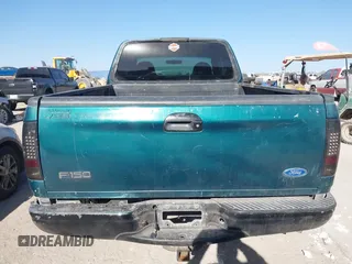 1997 Ford F-150 XL with VIN 1FTEX18L0VKC14651, listed as a IAAI auction lot 41228875 with 251,074 mi miles. Bid and sale history available at carsss.com. Image 17.