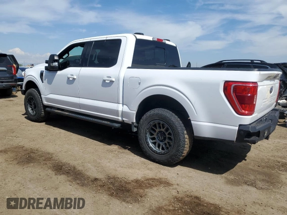 2021 Ford F-150 XL with VIN 1FTFW1E84MKD22275, listed as a Copart auction lot 56565655 with 92,867 mi miles and Salvage title. Bid and sale history available at DreamBid. Image 2.