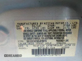 2012 Nissan Versa SV with VIN 3N1CN7AP4CL879273, listed as a IAAI auction lot 41316515 with 104,147 mi miles. Bid and sale history available at carsss.com. Image 9.