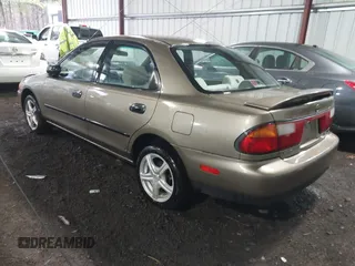 1998 Mazda Protege DX with VIN JM1BC141XW0200689, listed as a IAAI auction lot 41540162 with 172,311 mi miles and . Bid and sale history available at DreamBid. Image 3.