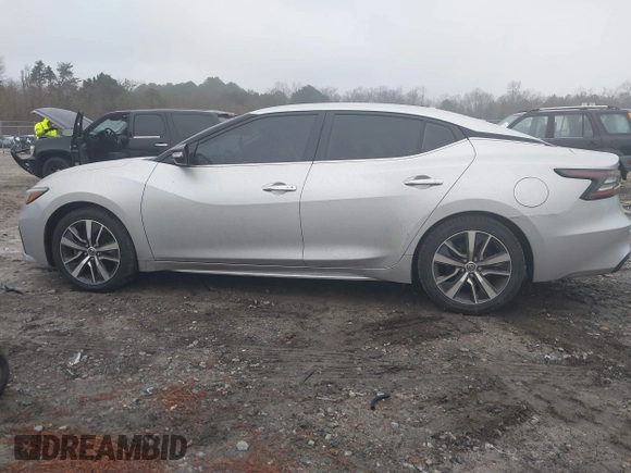 2019 Nissan Maxima Platinum z VIN 1N4AA6AV6KC372254, wystawiony jako IAAI lot #41519515 z przebiegiem 124 326 mil mil oraz . Historia ofert i sprzedaży dostępna na DreamBid. Obrazek 14.