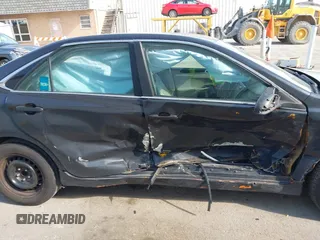 2015 Toyota Camry LE with VIN 4T1BD1FK6FU157623, listed as a IAAI auction lot 42015005 with 300,974 mi miles and . Bid and sale history available at DreamBid. Image 6.