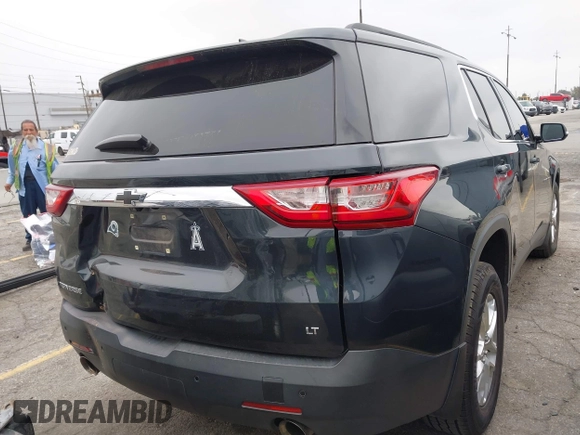 2020 Chevrolet Traverse LT Cloth with VIN 1GNERGKWXLJ320261, listed as a IAAI auction lot 42094336 with 51,063 mi miles. Bid and sale history available at carsss.com. Image 4.