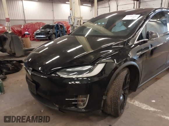 2016 Tesla Model X 70D with VIN 5YJXCBE23GF004941, listed as a IAAI auction lot 41706603 with 108,052 mi miles and . Bid and sale history available at DreamBid. Image 6.