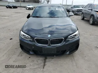 2015 BMW 2 Series M235i with VIN WBA1J7C50FV254060, listed as a Copart auction lot 43622085 with 61,397 mi miles and Salvage Title. Bid and sale history available at carsss.com. Image 5.