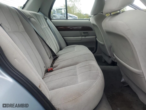2003 Mercury Grand Marquis GS Convenience with VIN 2MEFM74W63X704603, listed as a Copart auction lot 72118014 with 128,599 mi miles and Clean Title. Bid and sale history available at carsss.com. Image 10.