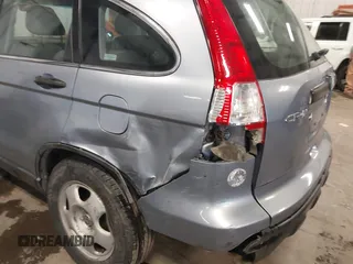 2009 Honda CR-V LX with VIN JHLRE48359C018488, listed as a IAAI auction lot 41824887 with 203,235 mi miles. Bid and sale history available at carsss.com. Image 17.