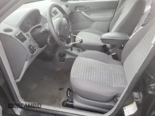 2005 Ford Focus S with VIN 1FAFP34N45W285454, listed as a Copart auction lot 59043485 with 165,071 mi miles and Salvage title. Bid and sale history available at DreamBid. Image 7.
