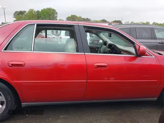 2002 Cadillac DeVille with VIN 1G6KD57YX2U257123, listed as a IAAI auction lot 41952025 with 180,278 mi miles. Bid and sale history available at carsss.com. Image 13.