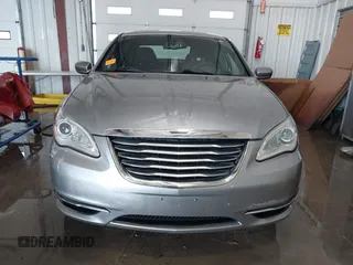 2014 Chrysler 200 Touring with VIN 1C3CCBBB0EN107711, listed as a IAAI auction lot 41576219 with 128,052 mi miles. Bid and sale history available at carsss.com. Image 12.