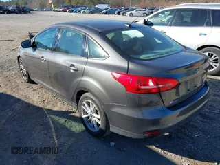 2015 Ford Focus SE with VIN 1FADP3F26FL280298, listed as a IAAI auction lot 40852000 with 144,805 mi miles and . Bid and sale history available at DreamBid. Image 3.