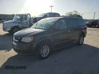 2014 Dodge Grand Caravan SXT with VIN 2C4RDGCG7ER263385, listed as a Copart auction lot 52678655 with 135,834 mi miles and Salvage Title. Bid and sale history available at DreamBid. Image 1.