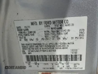 2011 Ford Escape XLS with VIN 1FMCU9C77BKC43743, listed as a Copart auction lot 54683435 with 186,928 mi miles and Clean title. Bid and sale history available at DreamBid. Image 14.