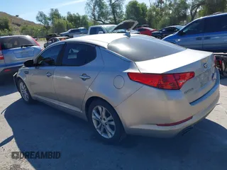 2013 Kia Optima EX with VIN 5XXGN4A7XDG128799, listed as a IAAI auction lot 41631612 with 191,124 mi miles. Bid and sale history available at carsss.com. Image 3.