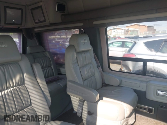 2006 Ford Econoline Cargo with VIN 1FDRE14L26HB21864, listed as a IAAI auction lot 42389174 with 295,623 mi miles and . Bid and sale history available at DreamBid. Image 8.