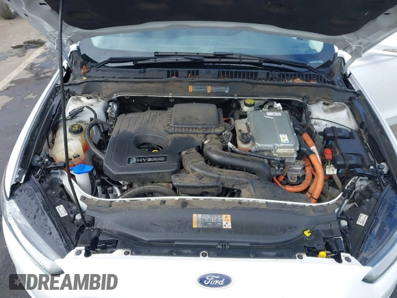 2016 Ford Fusion SE Hybrid with VIN 3FA6P0LU7GR397310, listed as a IAAI auction lot 42075891 with 124,879 mi miles. Bid and sale history available at carsss.com. Image 10.