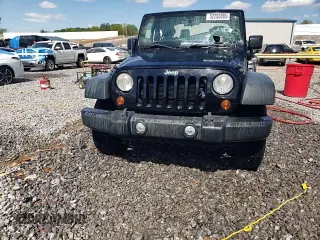 2013 Jeep Wrangler Sport with VIN 1C4AJWAG5DL694110, listed as a Copart auction lot 52200885 with 187,924 mi miles and Salvage Title. Bid and sale history available at carsss.com. Image 13.